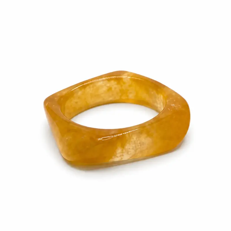 Amber gedraaide bangle armband met marble effect