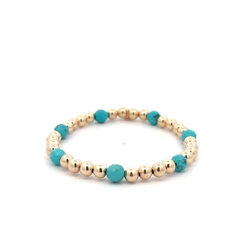 Angel 7 turquoise gold coloured