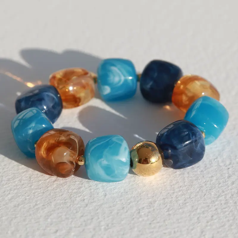 Armband cube golden ball blauw