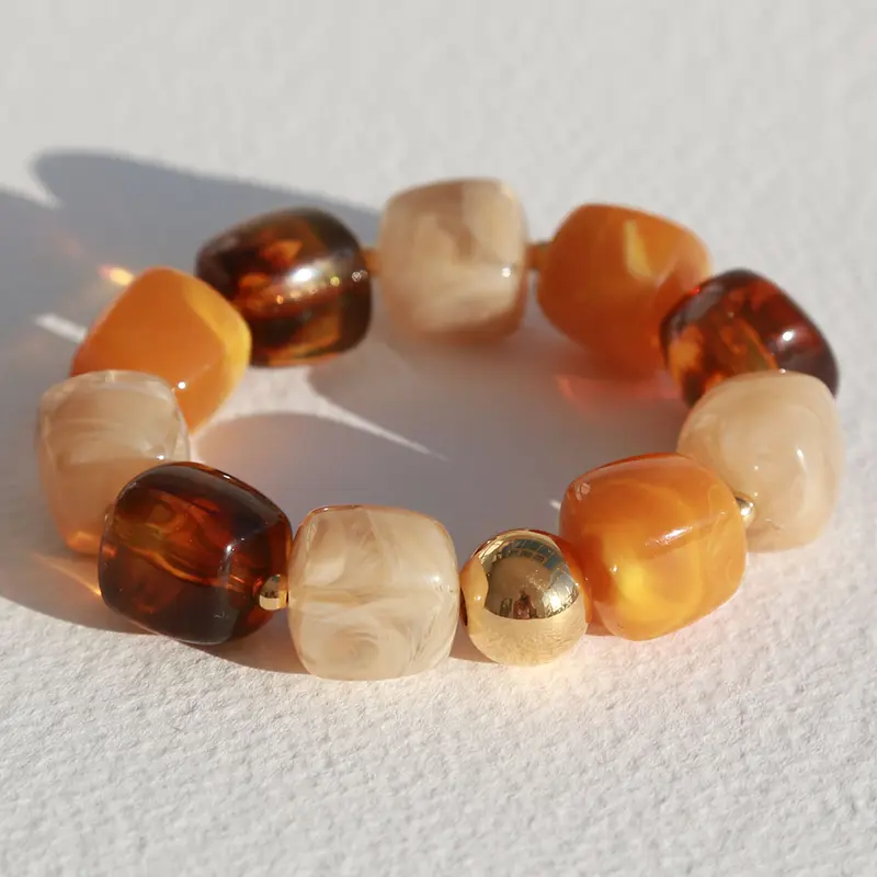 Armband cube golden ball bruin