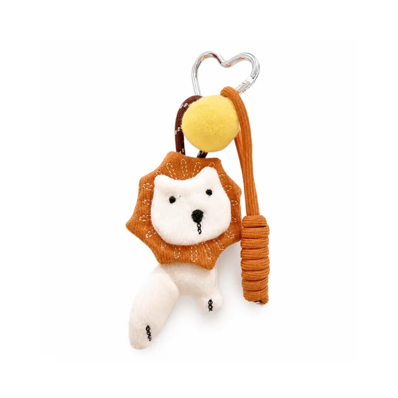 Beige leeuw pompon tashanger