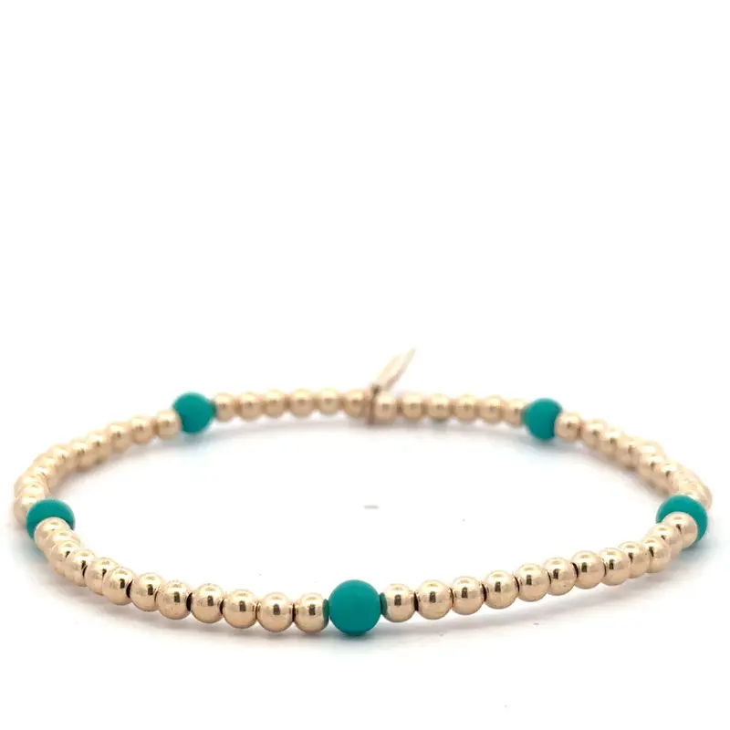 Dot 5 turquoise plain gold coloured
