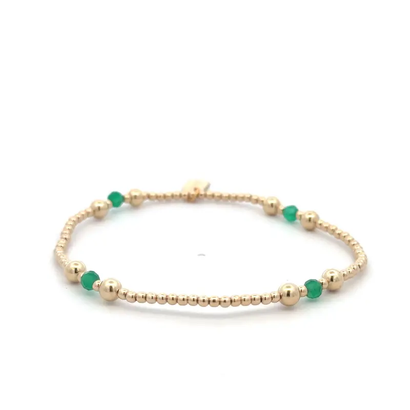 Four split green gold coloured