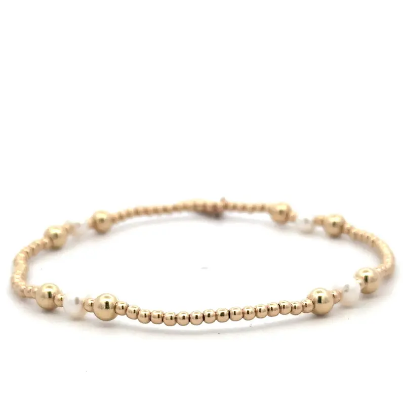 Four split pearl gold coloured