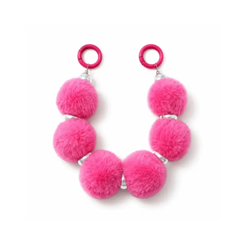 Fuchsia pompom tashanger met parels