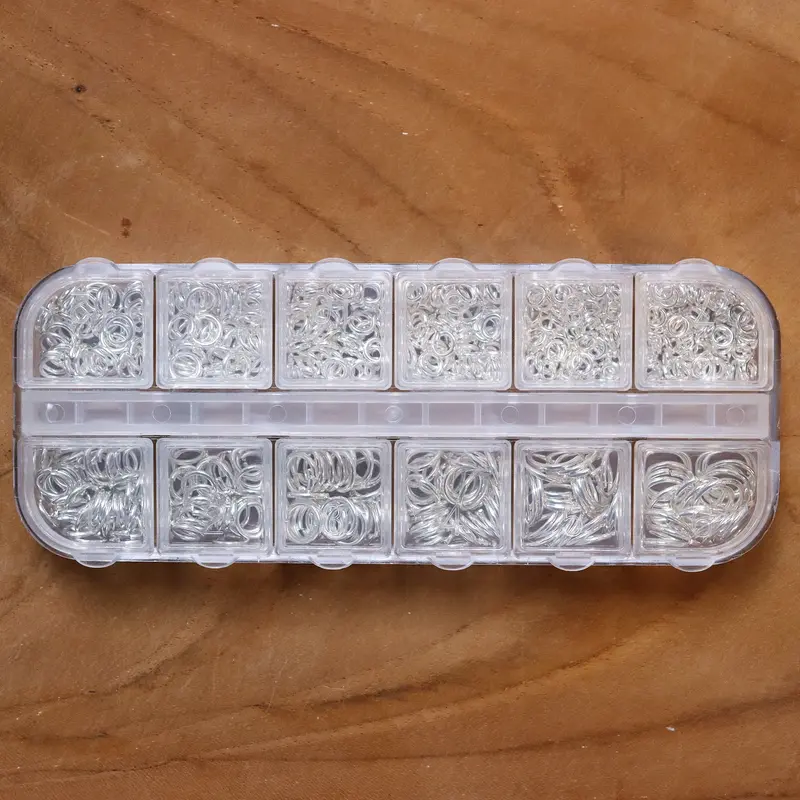 Gevulde kralendoos open ringetjes brass - zilver