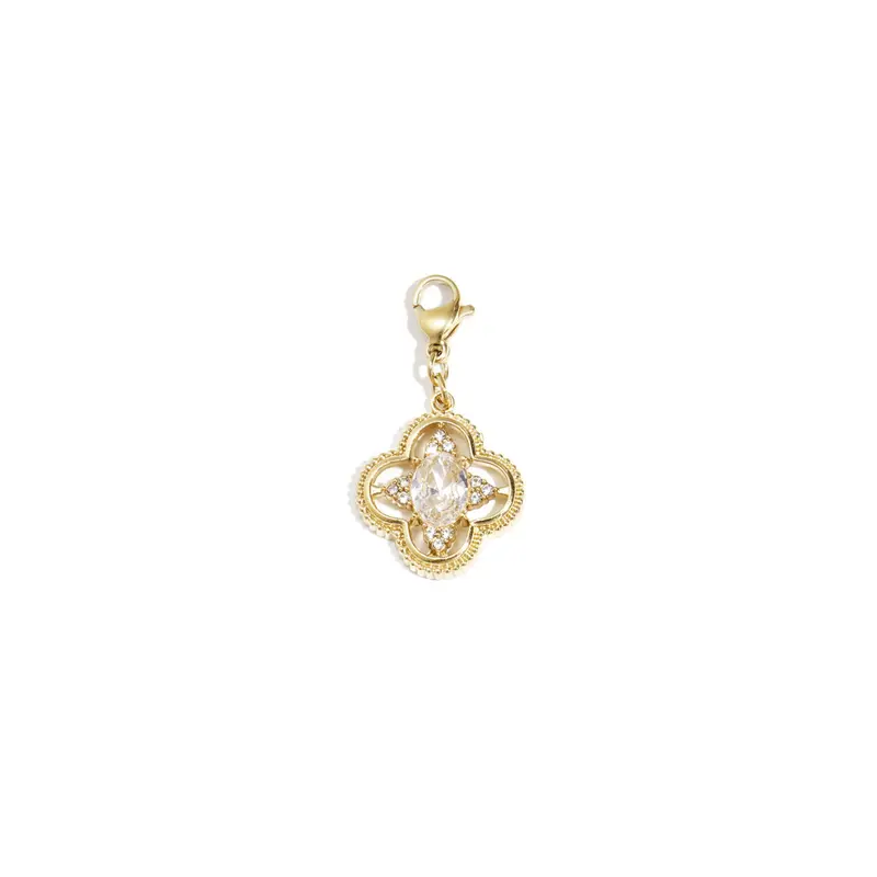 Gouden klaver bedel met strass