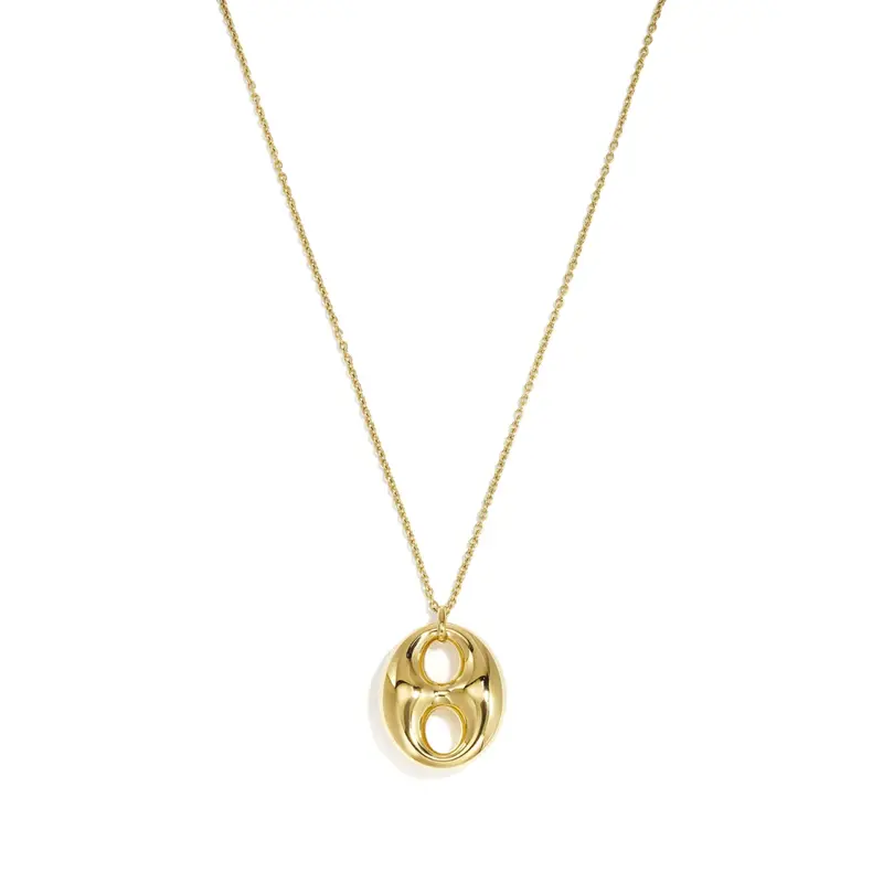 Gouden lange ketting met statement bean bedel