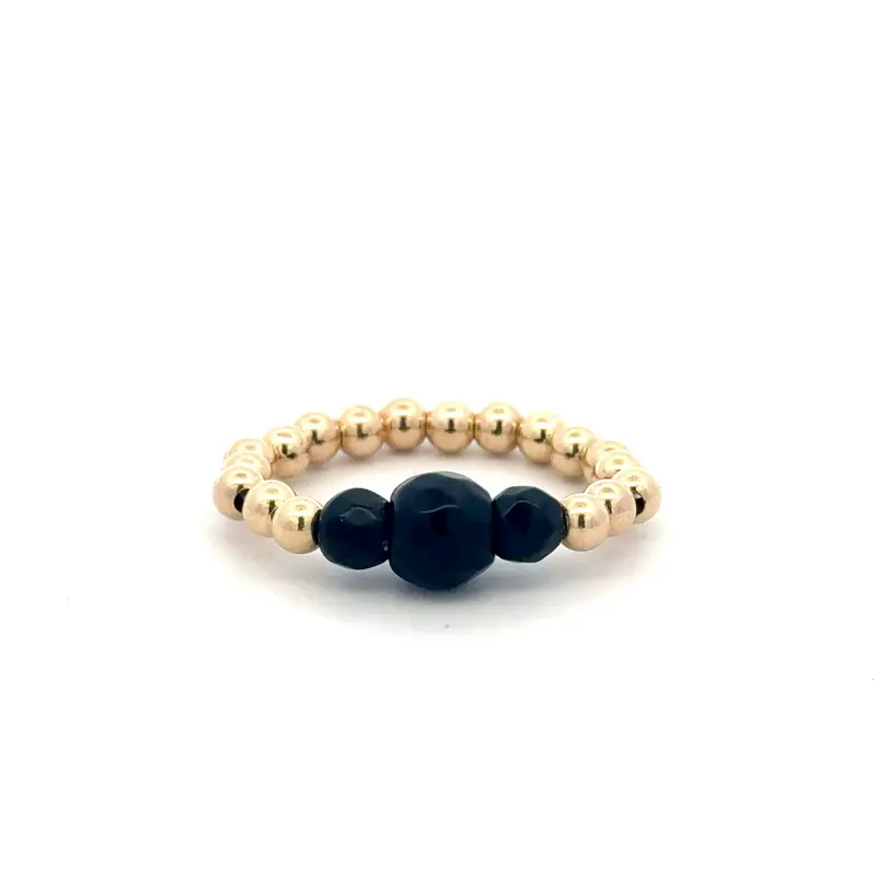 Ring three black gold coloured
