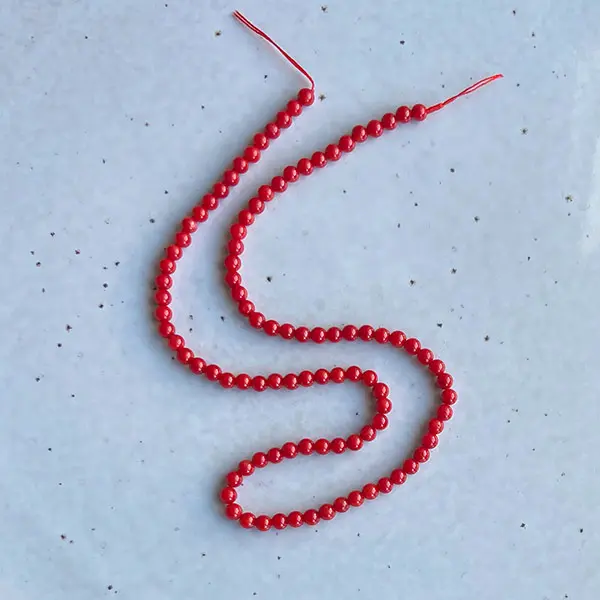 Streng kralen bamboe koraal rood 39 cm