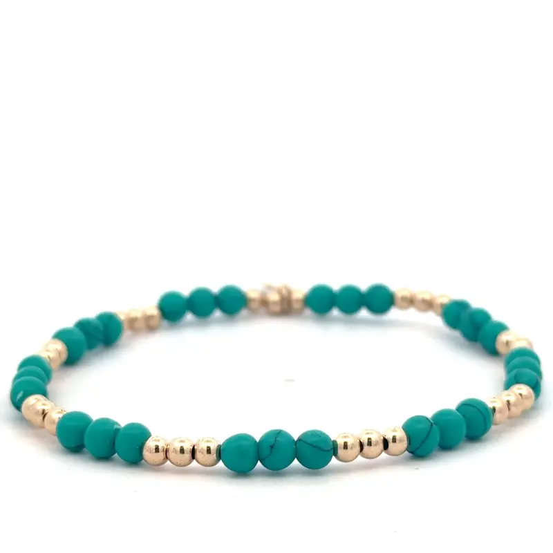 Three 3 turquoise plain gold coloured